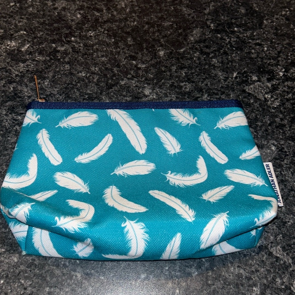 Clinique blue feather makeup bag